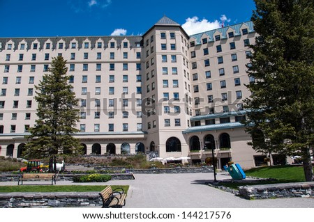 LAKE LOUISE, CANADA - June 16: View of the famous  Fairmount Chateau Lake Louise Hotel on June 16, 2013. Lake Louise is the second most-visited destination in the Banff National Park.