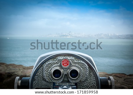 Binocular Next To The Waterside Promenade In San Francisco Looking Out To The Bay.
