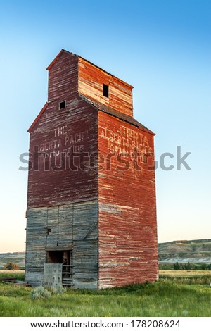 Long abandoned grain elevator in the badlands of the great plains.