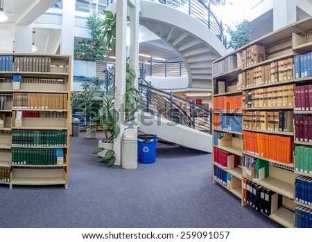 CALGARY, ALBERTA - MAR 7: The Law Library of the Faculty of Law at the University of Calgary on March 7, 2015 in Calgary, Alberta Canada.  This modern Law Library houses cases and statues of Canada.