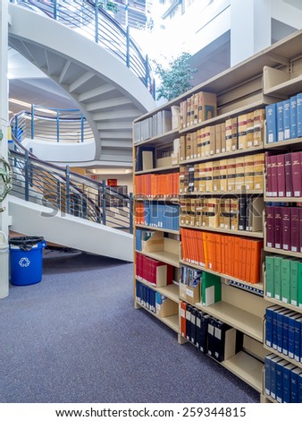 CALGARY, ALBERTA - MAR 7: The Law Library of the Faculty of Law at the University of Calgary om March 7, 2015 in Calgary, Alberta Canada.  This modern Law Library houses cases and statues of Canada.