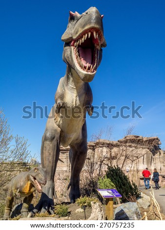 CALGARY, CANADA - APRIL 17: Animatronic Dinosaurs exhibits at the  Prehistoric Park section of the Calgary Zoo on April 17, 2015. The Prehistoric Park section recalls Alberta\'s dinosaur heritage.