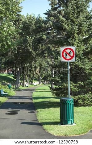 No dogs allowed sign in river side park in Saskatoon Saskatchewan