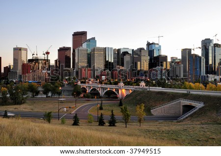 downtown Calgary, Alberta, Canada in the evening. Bow Tower under construction can be seen on the left.