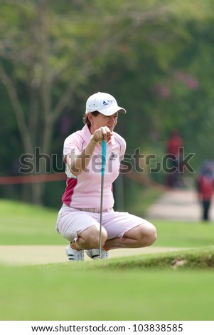 PATTAYA, THAILAND-FEBRUARY 16: Catriona Matthew of Scotland thinks of her next move during Day 1 of Honda LPGA 2012 on February 16, 2012 at Siam Country Club Old Course in Pattaya, Thailand