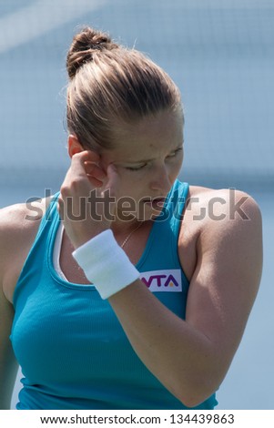 PATTAYA THAILAND - JANUARY 31: Olga Puchkova of Russia reacts after losing a point during 1st round of PTT Pattaya Open 2013 on January 31, 2013 at Dusit Thani Hotel in Pattaya, Thailand