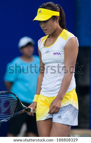 PATTAYA THAILAND - FEBRUARY 2: Ayumi Morita of Japan reacts after losing a point during 2nd round of PTT Pattaya Open 2013 on February 2, 2013 at Dusit Thani Hotel in Pattaya, Thailand