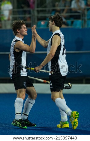 NANJING, CHINA-AUGUST 21: David Brydon of New Zealand Team (L) celebrates a goal with team member during Day 5 match against Pakistan at 2014 Youth Olympic Games on August 21, 2014 in Nanjing, China.