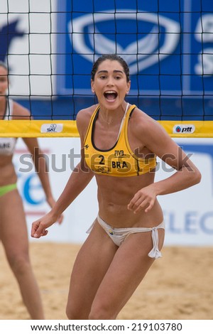 PHUKET, THAILAND-OCTOBER 31: Carolina Solberg Salgado of Brazil reacts after winning a point during a match on Day 2 of Phuket Open on OCTOBER 31, 2013 at Karon Beach in Phuket, Thailand
