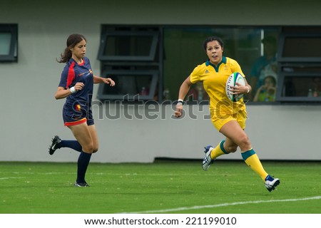 NANJING, CHINA-AUGUST 18: Australia Rugby Team (yellow) plays against Spain Rugby Team (blue) during Day 2 match of 2014 Youth Olympic Games on August 18, 2014 in Nanjing, China.