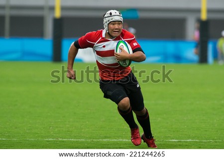 NANJING, CHINA-AUGUST 18: Kosuke Naka of Japan in action during Day 2 match of 2014 Youth Olympic Games on August 18, 2014 in Nanjing, China.