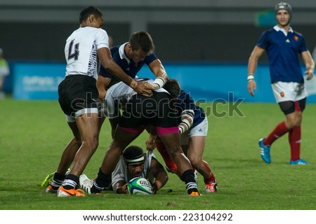 NANJING, CHINA-AUGUST 19: Fiji Rugby Team (white) plays against France Rugby Team during semifinals match of 2014 Youth Olympic Games on August 19, 2014 in Nanjing, China. France won 34-12.