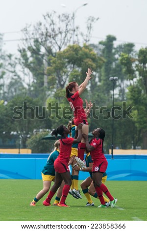 NANJING, CHINA-AUGUST 19: Canada Rugby Team (red) plays against Australia Rugby Team (red) during Day 3 match of 2014 Youth Olympic Games on August 19, 2014 in Nanjing, China. Australia wins 21-5.