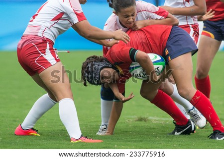 NANJING, CHINA-AUGUST 19: Spain Rugby Team (red-blue) plays against Tunisia Rugby Team (red) during Day 3 match of 2014 Youth Olympic Games on August 19, 2014 in Nanjing, China.