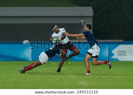 NANJING, CHINA-AUGUST 19: Fiji Rugby Team (white) plays against France Rugby Team during semifinals match of 2014 Youth Olympic Games on August 19, 2014 in Nanjing, China. France won 34-12.