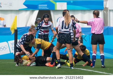 NANJING, CHINA-AUGUST 20: China Team (yellow) plays against USA Team (white/blue) during bronze medal match of 2014 Youth Olympic Games on August 20, 2014 in Nanjing, China. China wins 12-0.