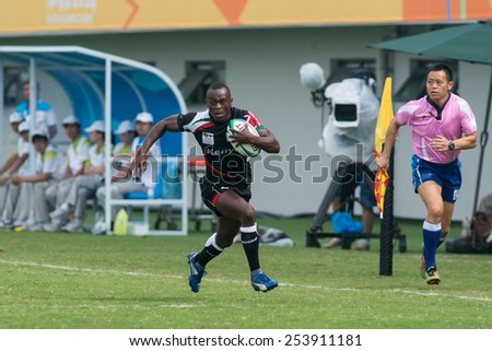 NANJING, CHINA-AUGUST 20: Edgar Khafumi of Kenya Rugby Team in action during bronze medal match of 2014 Youth Olympic Games on August 20, 2014 in Nanjing, China. Fiji wins 12-0.