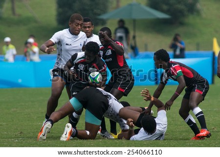 NANJING, CHINA-AUGUST 20: Fiji Rugby Team (white) plays against Kenya Rugby Team (black) during bronze medal match of 2014 Youth Olympic Games on August 20, 2014 in Nanjing, China. Fiji wins 12-0.