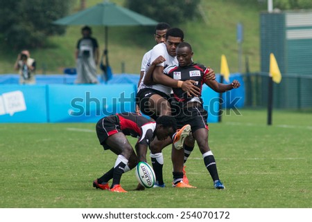 NANJING, CHINA-AUGUST 20: Fiji Rugby Team (white) plays against Kenya Rugby Team (black) during bronze medal match of 2014 Youth Olympic Games on August 20, 2014 in Nanjing, China. Fiji wins 12-0.