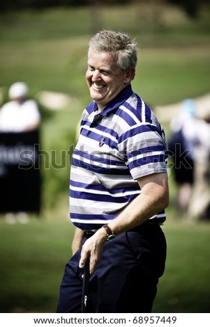 HUA HIN THAILAND - JANUARY 8: Scottish golfer and team captain Colin Montgomerie smiles during day 2 of The Royal Trophy Europe VS Asia on January 8, 2011 at Black Mountain Golf Club Hua Hin Thailand