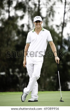HUA HIN THAILAND - DECEMBER 16: Swedish golfer Alexander Noren at the 9th hole on Day 1 of Black Mountain Masters 2010 on December 16, 2010 at Black Mountain Golf Club in Hua Hin Thailand