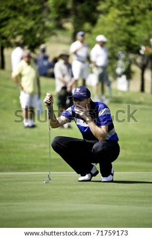 HUA HIN THAILAND - JANUARY 9: Swede golfer Fredrik Andersson Hed thinks of his next move on final day of The Royal Trophy tournament on January 9, 2011 at Black Mountain Golf Club in Hua Hin Thailand