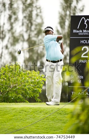 HUA HIN, THAILAND - DECEMBER 16: M. Sasidaran of Malaysia takes a swing at TEE 2 on Day 1 of  Black Mountain Masters 2010 on December 16, 2010 at Black Mountain Golf Club in Hua Hin, Thailand