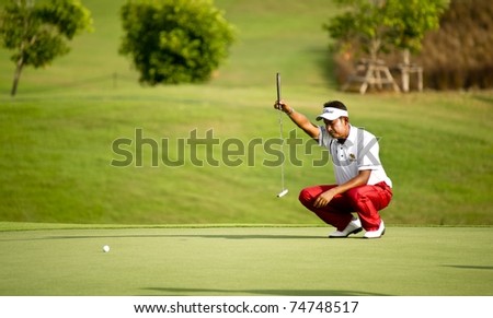 HUA HIN, THAILAND - DECEMBER 16: Thaworn Wiratchant of Thailand thinks of his next move on Day 1 of  Black Mountain Masters 2010 on December 16, 2010 at Black Mountain Golf Club in Hua Hin, Thailand