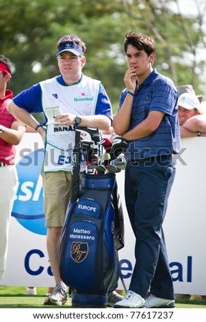 HUA HIN THAILAND - JANUARY 7: Matteo Manassero of Italy thinks of his next move on day 1 of The Royal Trophy Europe VS Asia on January 7, 2011 at Black Mountain Golf Club in Hua Hin Thailand
