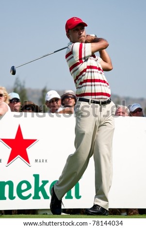 HUA HIN THAILAND - JANUARY 8: Indian golfer Jeev Milkha Singh in action during Day 2 of The Royal Trophy Europe VS Asia on January 8, 2011 at Black Mountain Golf Club in Hua Hin Thailand
