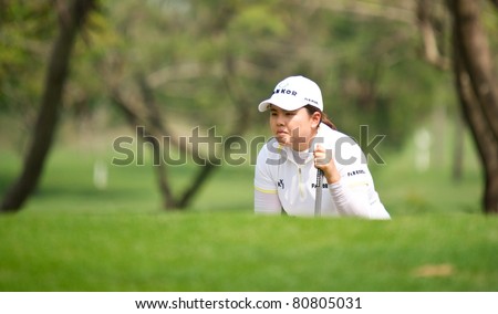 PATTAYA THAILAND - FEBRUARY 18: Korean golfer Inbee Park thinks of her next move during Day 2 of Honda LPGA Thailand 2011 on February 18, 2011 at Siam Country Club Old Course in Pattaya, Thailand