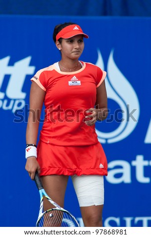 PATTAYA THAILAND - FEBRUARY 9: Sania Mirza of India reacts after losing a point during Round 2 of PTT Pattaya Open 2012 on February 9, 2012 at Dusit Thani Hotel in Pattaya, Thailand