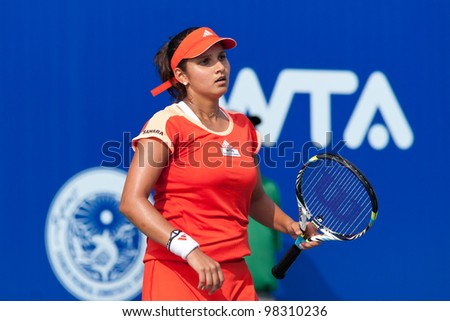 PATTAYA THAILAND - FEBRUARY 9: Sania Mirza of India reacts after losing a point during Round 2 of PTT Pattaya Open 2012 on February 9, 2012 at Dusit Thani Hotel in Pattaya, Thailand