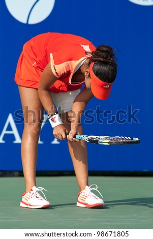 PATTAYA, THAILAND - FEBRUARY 9: Sania Mirza of India reacts after losing a point during Round 2 of PTT Pattaya Open 2012 on February 9, 2012 at Dusit Thani Hotel in Pattaya, Thailand