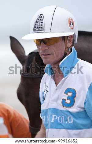 HUA HIN, THAILAND - APRIL 6: Harold Link of the Thai Polo Team during the break of 2nd chukker of 2012 Asian Beach Polo Championship on April 6, 2012 in Hua Hin, Thailand. Thai Polo Team wins 5-3.