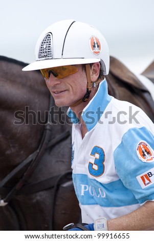 HUA HIN, THAILAND - APRIL 6: Harold Link of the Thai Polo Team during the break of 2nd chukker of 2012 Asian Beach Polo Championship on April 6, 2012 in Hua Hin, Thailand. Thai Polo Team wins 5-3.