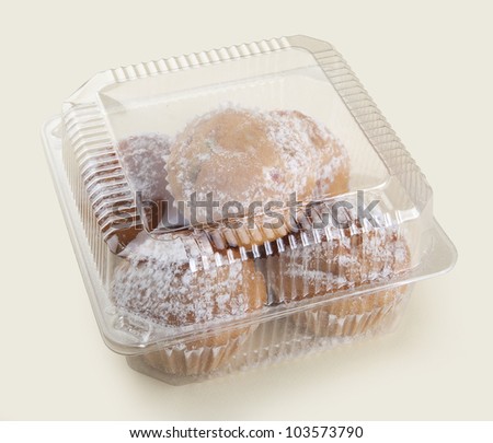 Some cakes in the plastic box