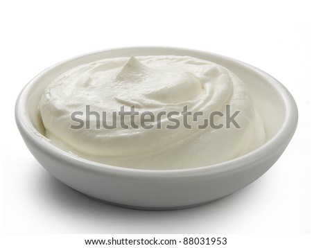 Sour cream in a white bowl