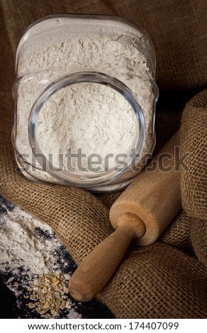 Flour in a glass jar, pastry and bread baking concept