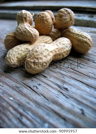Peanuts in the shell on an old retro window sill