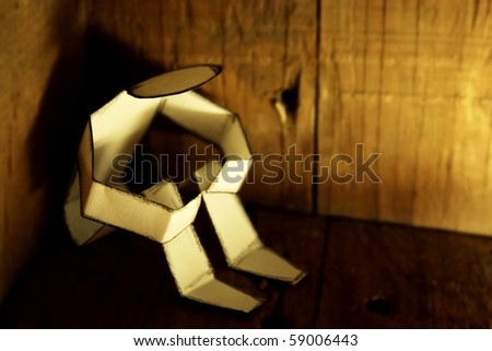 stock photo sad paper person in corner Save to a lightbox 
