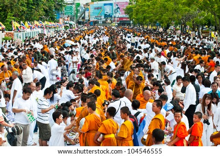 UBONRATCHATHANI/THAILAND-JUNE 2:Buddhist monks during the ceremony relic for worship in the 2600 years of Buddha enlightenment (overcome demons and passions) on June 2,2012 in UbonRatchathani,thailand