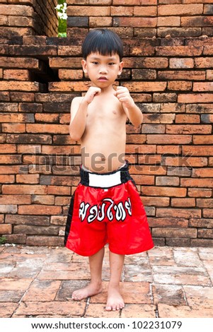 Thai boxing-letters on the pants not Contains potential trademark or copyright infringement but Thai language is name \