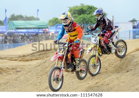 NAN, THAILAND - JUN 03: An unidentified rider participates in the 3rd round (Class C Type) of Motocross 2012 Thailand motocross championship on June 03, 2012 in Nan Province, Thailand.