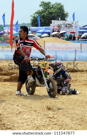 NAN, THAILAND - JUN 03: An unidentified rider participates in the 3 rd round  of Motocross 2012 Thailand motocross Junior championship on June 03, 2012 in Nan Province, Thailand.