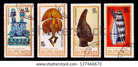 BURUNDI - CIRCA 1981: A set of postage stamps printed in BURUNDI shows masks and statues of the world\'s people, series, circa 1981