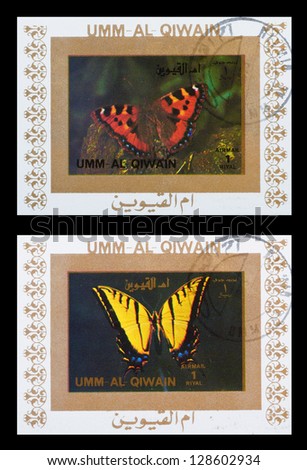 UMM AL-QUWAIN - CIRCA 1973: A set of postage stamps printed in UMM AL-QUWAIN shows butterflies, series, circa 1973