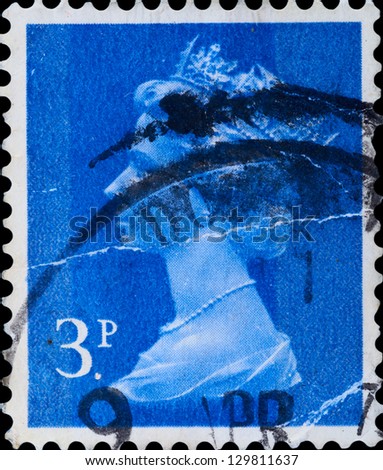 UNITED KINGDOM - CIRCA 1970: Stamp printed in the UK shows the head of state (Queen Elizabeth), series, circa 1970