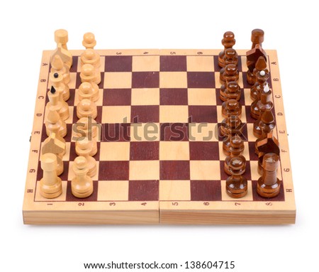 The wooden chess pieces on a chess board isolated on a white background
