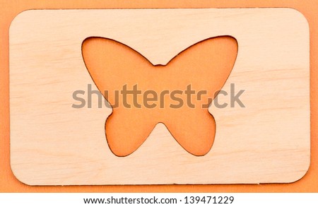 wooden stencil in the form of butterflies